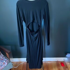 Bodycon black dress with opening